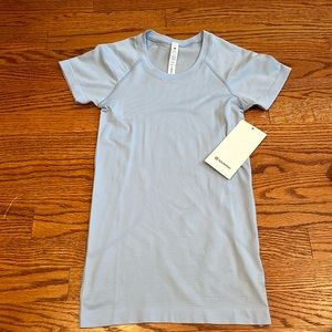 Blue short sleeve Lululemon swiftley tech, size 2, new with tag
